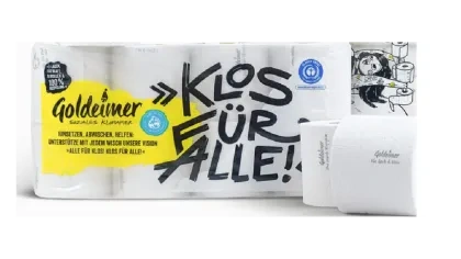 Klopapier der Marke Goldeimer, mit den Schriftzügen &quot;Klos für Alle&quot; und &quot;Soziales Klopapier&quot;
