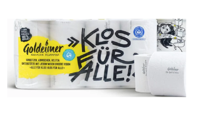 Klopapier der Marke Goldeimer, mit den Schriftzügen &quot;Klos für Alle&quot; und &quot;Soziales Klopapier&quot;